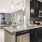 kitchen and living area with an island and bright, natural lighting