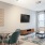living area that includes ample seating spaces and bright lighting